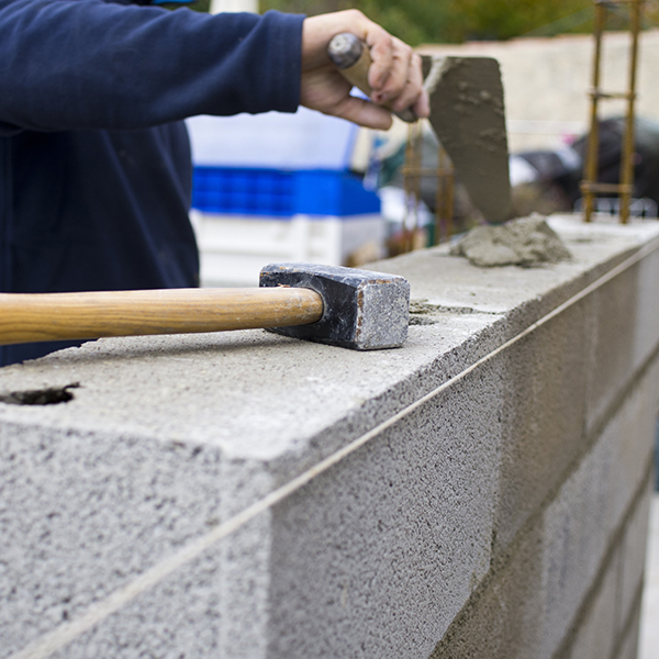 Comment construire un muret maçonné en parpaing